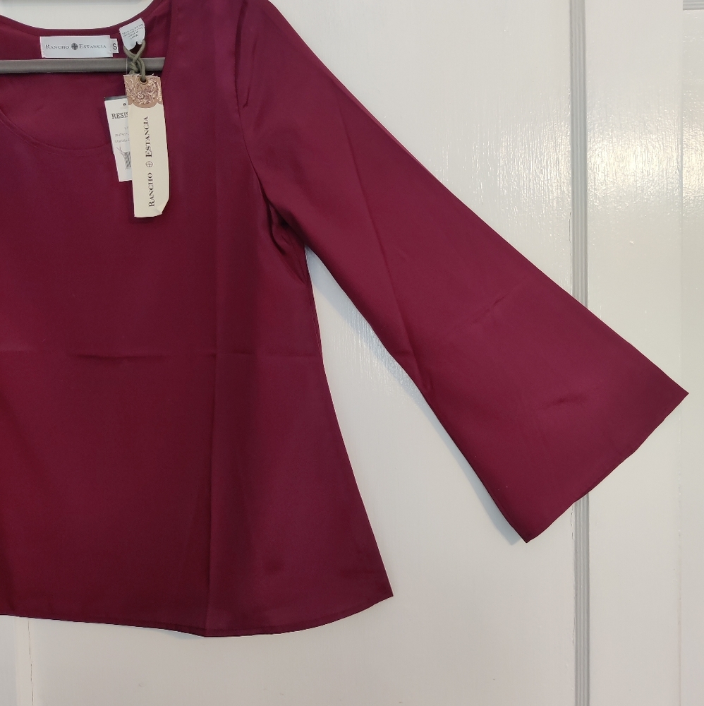 Women's size small wine colored long sleeve blouse
